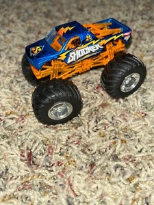 Monster Jam SHOCKER ORANGE BLUE Silver Rims Hot Wheels - Picture 1 of 3