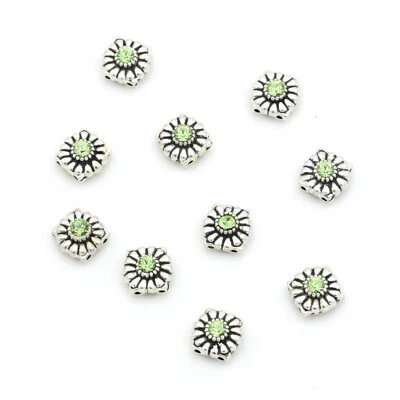 Cuentas espaciadoras deslizantes de metal plateado con cristal de Swarovski verde 10 piezas  Foto 1 de 3