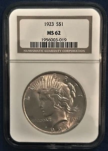 1923 US Peace Silver $1 - NGC Graded MS 62 - CRACKED PLANCHET & LAMINATION - L90 - Picture 1 of 6