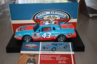 #43 Richard Petty 1984 STP Pontiac Firecracker 400 200th Win NASCAR Classics - Image 1 of 4