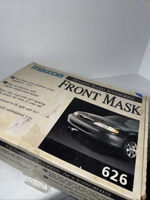 Genuine MAZDA 626 Front Mask, Cover, Bra, Fits 1993 626. Black HD Vinyl. NOS - Image 1 of 4