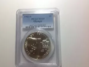 1983-S Olympic PCGS MS69 (yellow/orange) - Picture 1 of 2