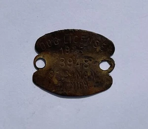 Licencia de etiqueta fiscal de perro de latón 1935 del condado de Saginaw, Michigan, EE. UU. - Imagen 1 de 2