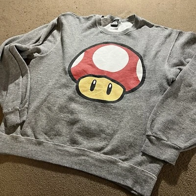 2014 SUÉTER SUPER MARIO MUSHROOM NINTENDO JERZEES CARBÓN MEDIO CUELLO REDONDO Foto 1 de 4