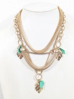 Collar llamativo multicadena tono dorado con dije de hoja tropical de Nueva York de 20 pulgadas Foto 1 de 4