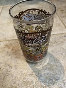 Vintage Coca Cola 70's Orange, Yellow, Brown, Red Flowered 16 oz Glass - Picture 1 of 6