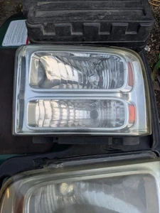 2005-2007 Ford F250 SD LH Headlight Dual Beam Driver Side  - Picture 1 of 3