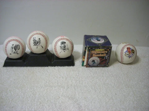 3 Mcdonalds baseballs colectors item plus 2 more balls. 1 Mickey Mantle replica Cover