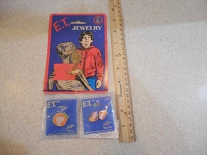 ET E.T. COLLANA GERTIE CIONDOLO DREW BARRYMORE STAR POWER 1982 ORECCHINI & SPILLA - Foto 1 di 9