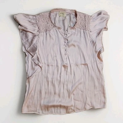 Blusa satinada rosa claro Elie Tahari talla M botones ajustados manga acampanada NUEVA Foto 1 de 4