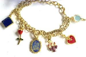 NUEVO ~ PULSERA CON DIJE AJUSTABLE 6 DIJES "LA BELLA Y LA BESTIA" DE DISNEY - Imagen 1 de 2