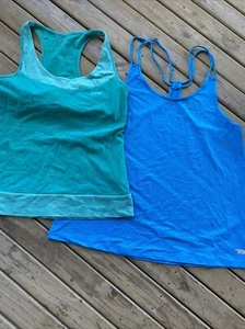 2 Active Wear sports tops. ( 1x running bear and 1x target) - Picture 1 of 7