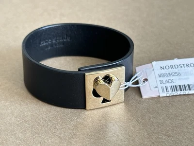 🆕 Brazalete Kate Spade NY de cuero negro diseño de bloqueo de corazón dorado | Talla única Foto 1 de 4