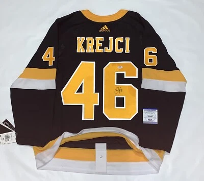 DAVID KREJCI SIGNED ADIDAS CLIMALITE BOSTON BRUINS ALTERNATE JERSEY PSA COA - Image 1 of 3