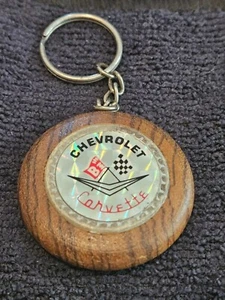 Vintage Corvette keychain emblem on wood - hard to find - may be rare - Picture 1 of 8