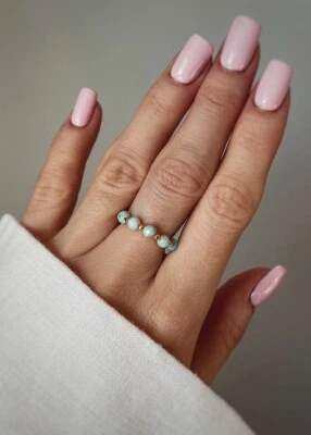 A++ Hermosos anillos elásticos redondos facetados de piedras preciosas Larimar para mujer Foto 1 de 4