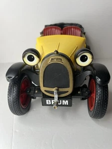 Vtg Radio Shack Ragdoll Brum Yellow RC Toy Car - No Remote - Works - Used - Picture 1 of 8