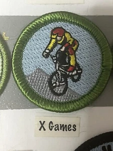 XGAMES X JUEGOS BMX BICICLETA BICICLETA MÉRITO INSIGNIA PARCHE BOY SCOUT PARCHE DIVERTIDA PARODIA - Imagen 1 de 1