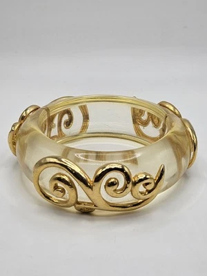 Vintage Clear Lucite Gold Tone Swirl Scroll Embellishments Bangle Bracelet - Image 1 of 4