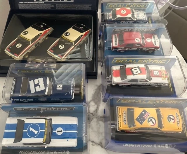 1:32 Scale Scaletrix 1970s  4 Ford vs  4 Holden Race Cars - image 1 of 4