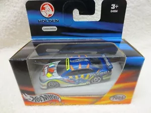 COMMODORE SILVER & BLUE HOT WHEELS 2004 RELEASE IN BOX HOLDEN 1:64 SCALE - Bild 1 von 4