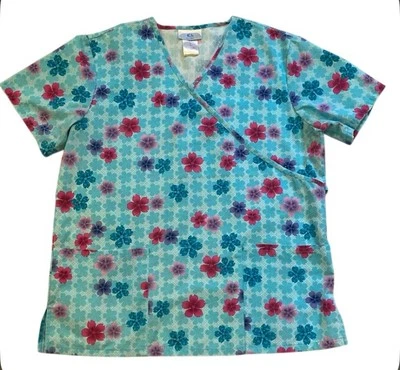 Blusa Médica Estampada SB Azul Floral, Cuello en V, Corbata Trasera, Talla Mediana Foto 1 de 4