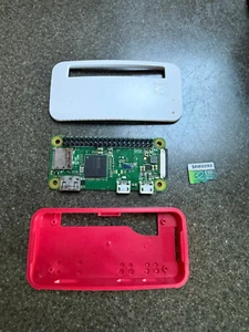 Raspberry Pi Zero V1.1 with WiFi, Official Case and MicroSD Card. - Afbeelding 1 van 3