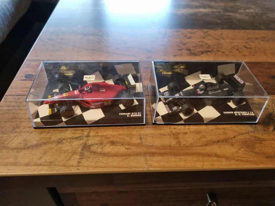 Minichamps Formel 1 Autos Ferarie 412 T1 und Sauber Mercedes  C13  - Bild 1 von 1
