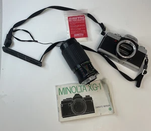 Vintage Minolta XG 1 35mm Film Camera 1:4.5 75mm-200m Lens & manual - Picture 1 of 12