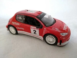 Modellino auto PEUGEOT 206 WRC 2003 scala 1:43 model car rossa corsa - Foto 1 di 6