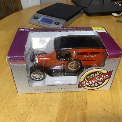 1/28 scale model 1916 Studebaker truck bank--Massey Ferguson - Image 1 of 4