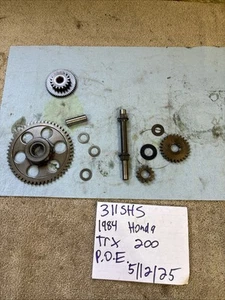 1984 Honda TRX 200 engine starter motor gears 311 - Picture 1 of 9