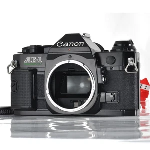 Canon AE-1 Program analoge 35-mm-Spiegelreflexkamera schwarzes Gehäuse aus Japan [Exc+5] - Bild 1 von 16