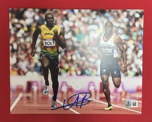 Usain Bolt Autographed 8x10 Photo Gold Medalist Beckett BAS COA - Picture 1 of 1