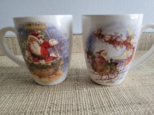 Pottery Barn Nostalgic Santa  Mug Set of 2 Hot Air Ballon & Sleigh Santa - Picture 1 of 3