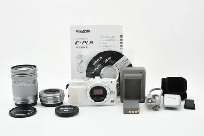 Cámara Olympus Pen Lite E-PL6 16,1 MP con lente m.zuiko 14-42 mm EZ + 40-150 mm R [Exc Foto 1 de 4