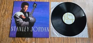 Stanley Jordan Flying Home Vinyl LP 1988 EMI Manhattan E1-48682 - Imagen 1 de 2
