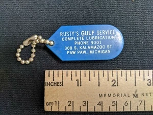 Llavero vintage RUSTY'S GULF gasolinera pata de aceite pata de Michigan moneda - Imagen 1 de 3