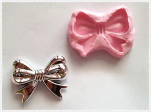 stampo in gomma per fimo cernit fiocco 4,5x4 cm - Picture 1 of 1