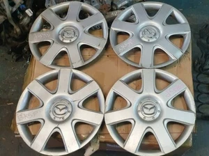 MAZDA 3 5 2003-2010 15 POLLICI COPRIMOZZO RUOTA ORIGINALE SET 4 GUARNIZIONI GJ6R37170 - Foto 1 di 9