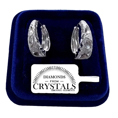 Orecchini Cerchi Grandi 21/7mm pl. oro Bianco 18K Satinati da Donna 4/14 - Immagine 1 di 3