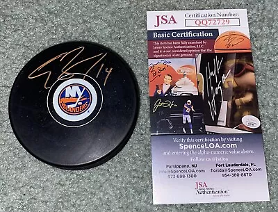 Disco con logotipo de los islanders de Nueva York firmado por Travis Zajac con certificado de autenticidad JSA Foto 1 de 2
