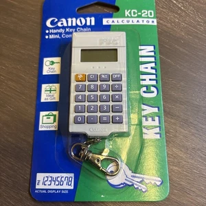 Vintage Canon KC-20 Mini Taschenrechner Schlüsselanhänger Neu Versiegelt Selten 1998 - Bild 1 von 10