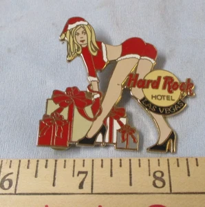 PIN GRANDE HARD ROCK HOTEL MUJER CON REGALOS DE NAVIDAD - Imagen 1 de 2