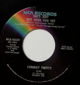 CONWAY TWITTY SHE'S JUST NOT OVER YOU YET/LINDA ON MY MIND MCA VINYL 45 56-78 - Picture 1 of 3
