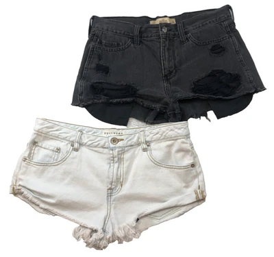 Lote de 2 pantalones cortos de jean Hollister & Bullhead Denim Co para mujer talla 7 desgastados Foto 1 de 4