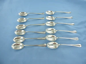 A VINTAGE STERLING SILVER SET OF 12 O/E RAT TAIL  TEASPOONS SHEFFIELD 1933. - Picture 1 of 8