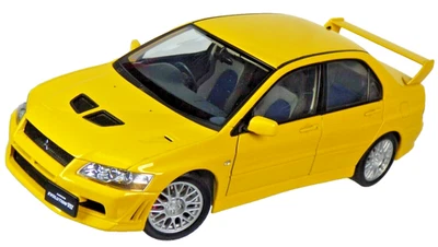 Литая желтая модель автомобиля Mitsubishi Lancer Evolution VII AutoArt 1:18 Evo 7 - Изображение 1 из 4