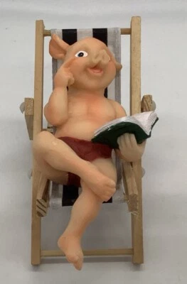Vintage Anthropomorphic Male Pig Reading Book Sunbathing Figurine Beach Chair - Image 1 of 4