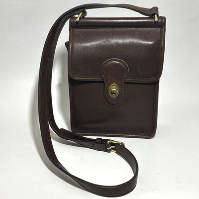 Bolso de hombro COACH Murphy vintage de cuero con cierre giratorio marrón caoba Foto 1 de 4